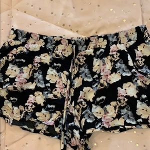 Black shorts with flower pattern